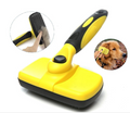 Self-cleaning pet grooming brush